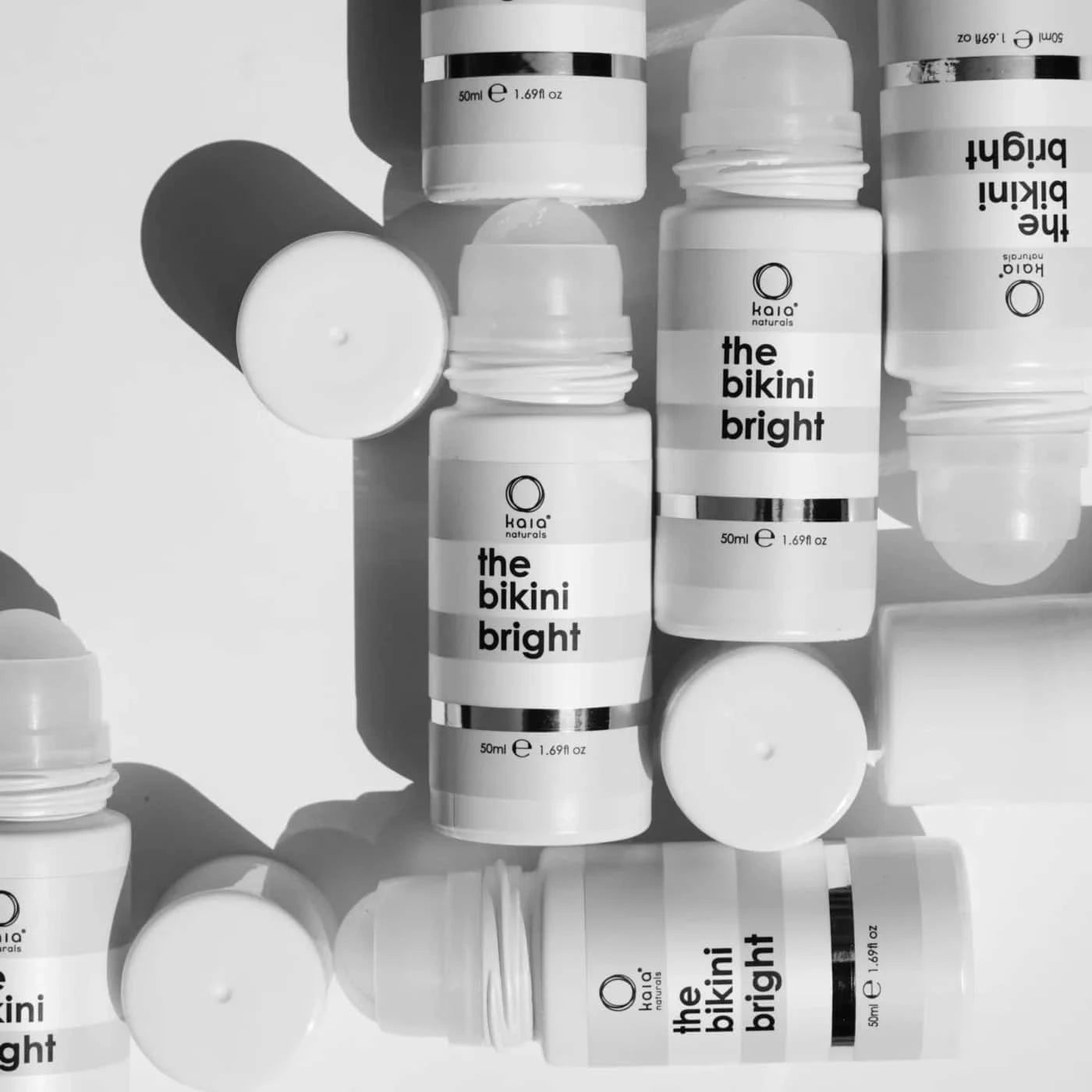 A collection of Kaia Naturals "the bikini bright" roll-on serums.